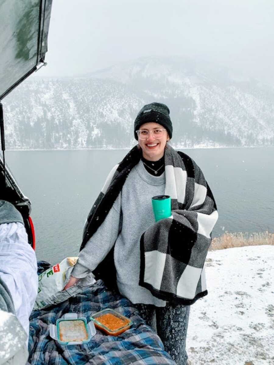 Sober woman in the snowy mountains