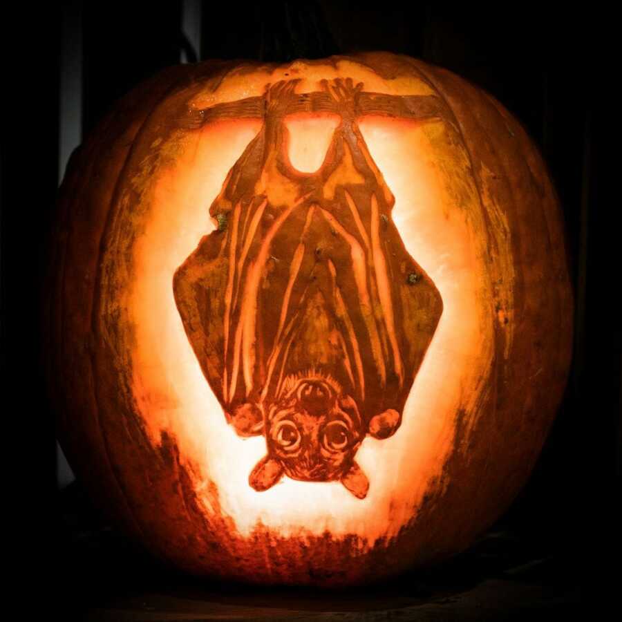 Detailed pumpkin carving of a bat, created by Maniac Pumpkin Carvers. 