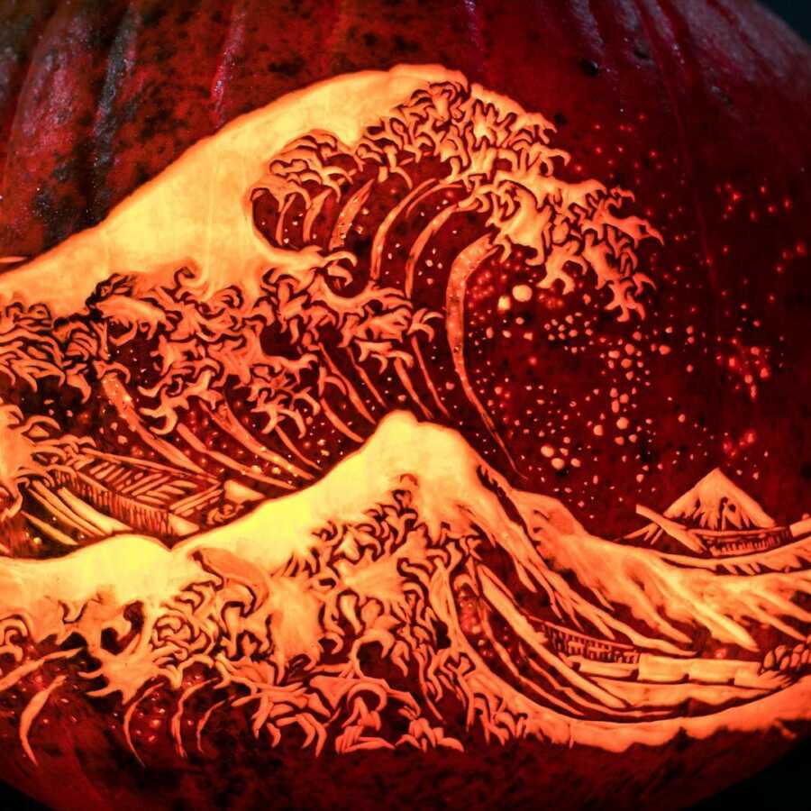 Pumpkin carving of The Great Wave off Kanagawa, created by Maniac Pumpkin Carvers. 