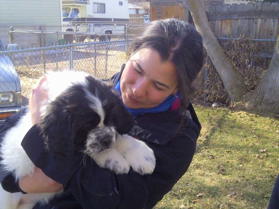 Marianna holds her new puppy, Maggie, who was a gift from her mother.