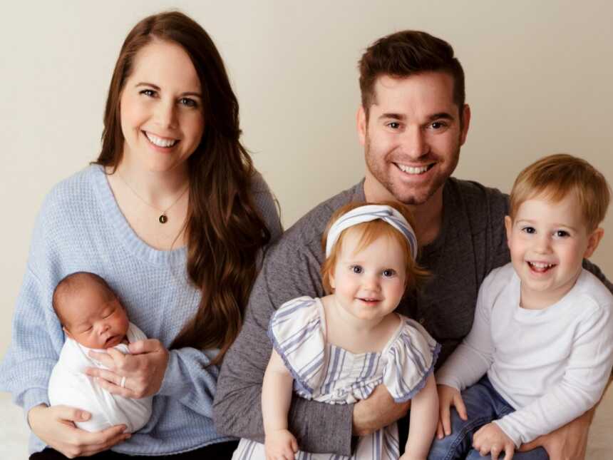 Family of five with adopted baby boy