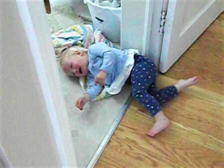 Toddler throwing a tantrum over frozen green beans. 