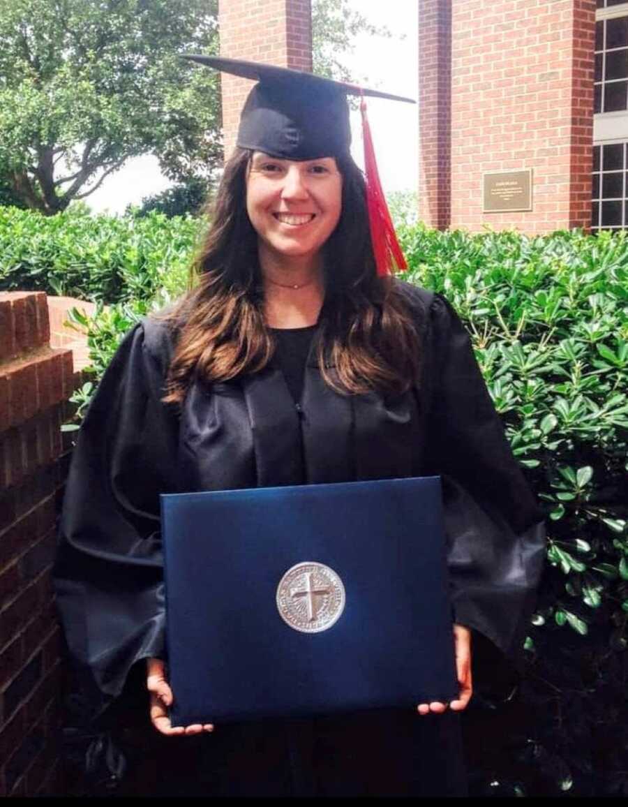 Young woman gets her college degree despite the trauma she's experienced