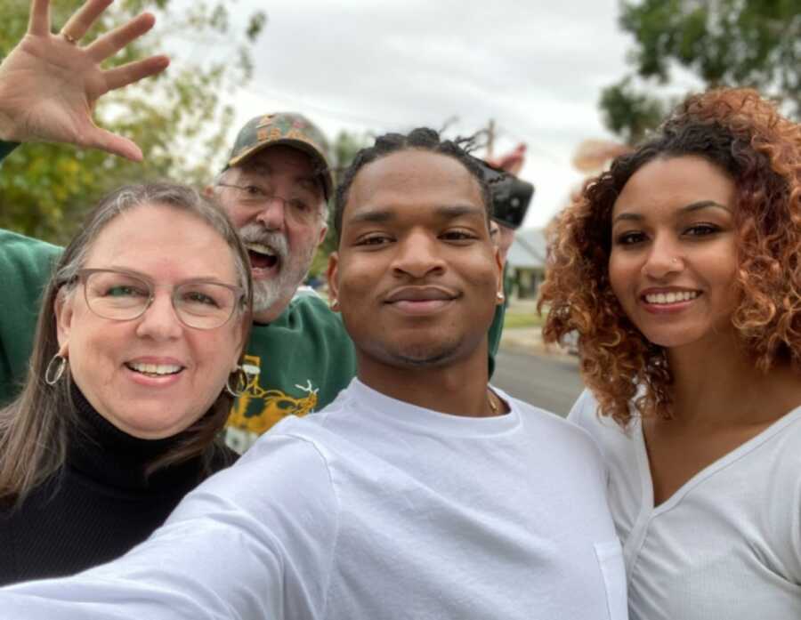 'adoptive' grandparents with the guy and his girlfriend they accidentally invited to thanksgiving