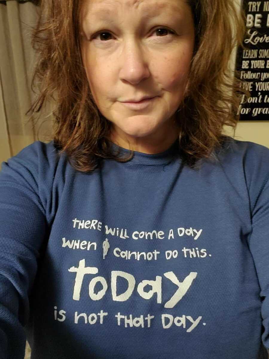 shirt saying how the woman is feeling about cancer 