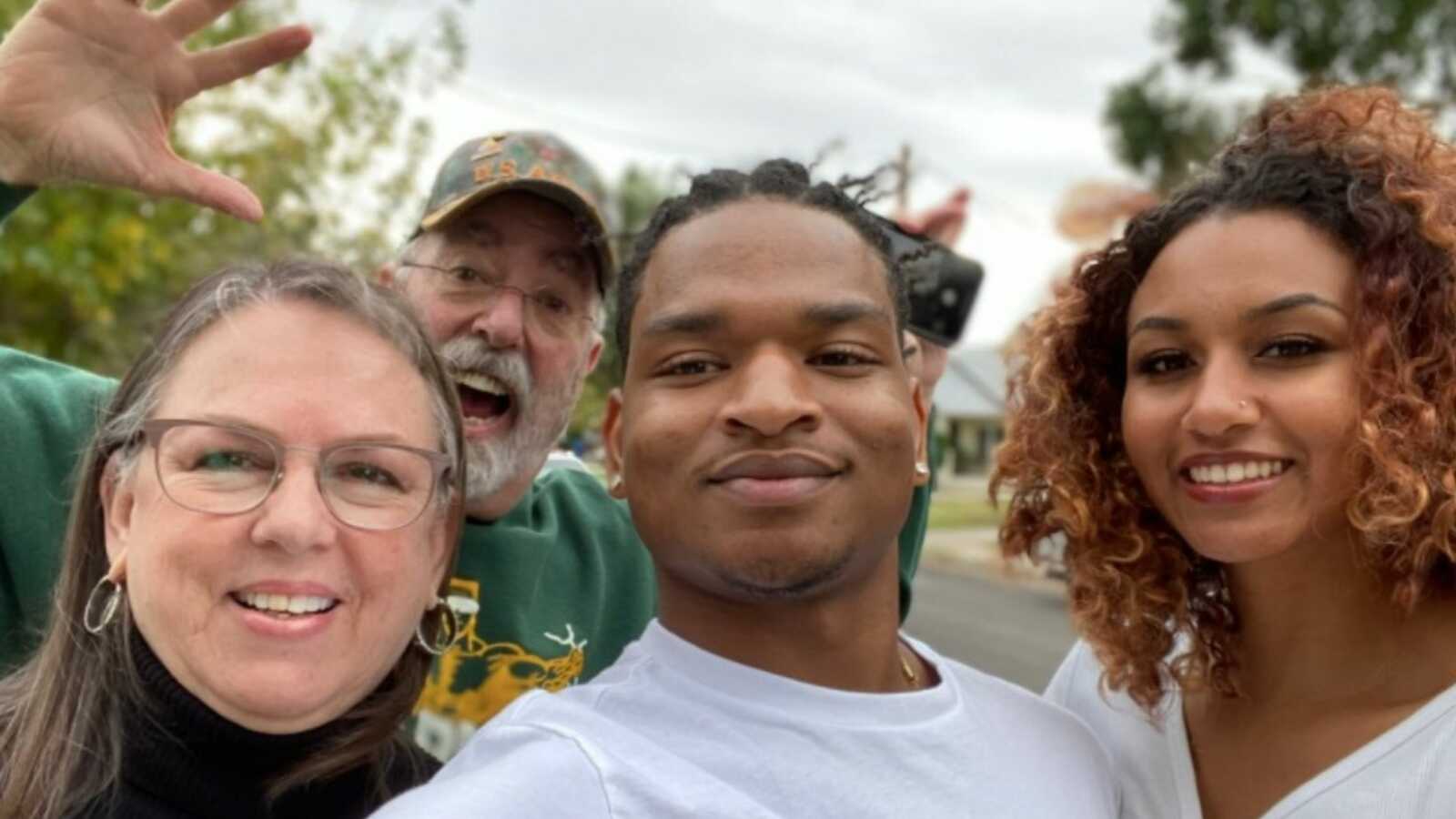 'adoptive' grandparents with the guy and his girlfriend they accidentally invited to thanksgiving
