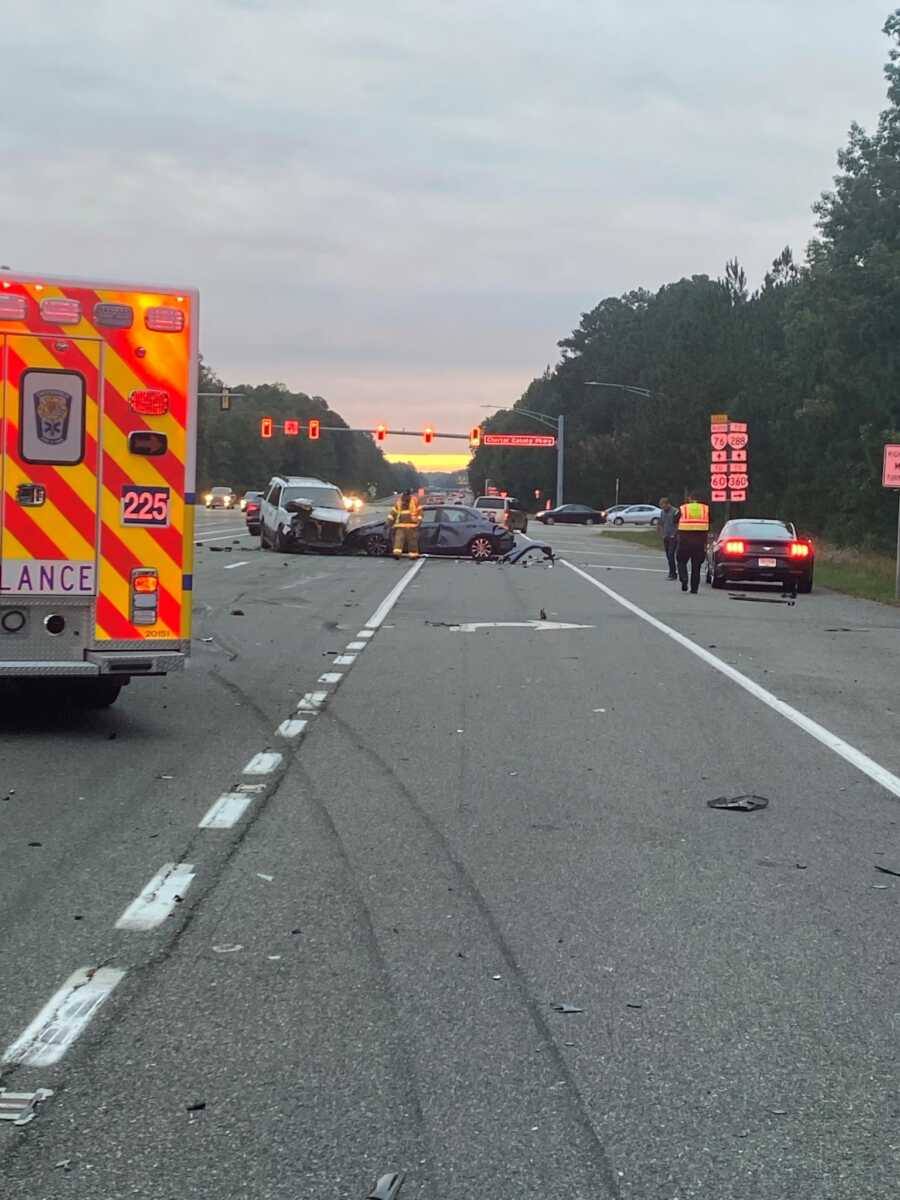 the accident scene from a far with ambulances in the photo