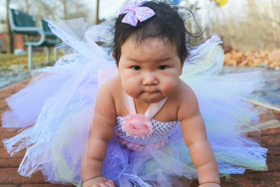 The Banion's baby girl wears an adorable tutu dress. 