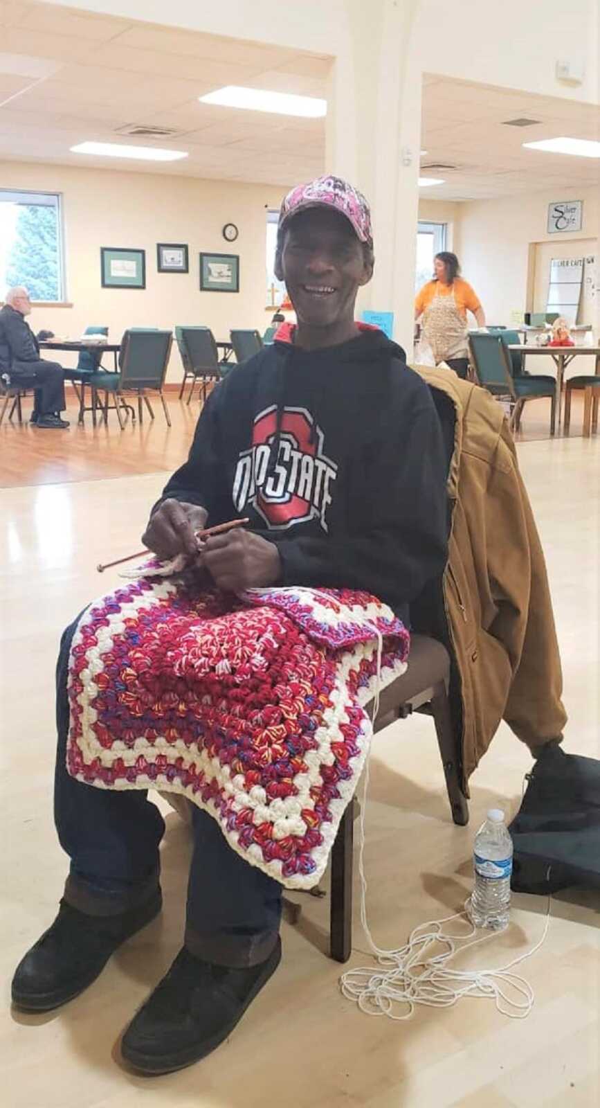 Larry crochets lap blankets for homeless people in his community.
