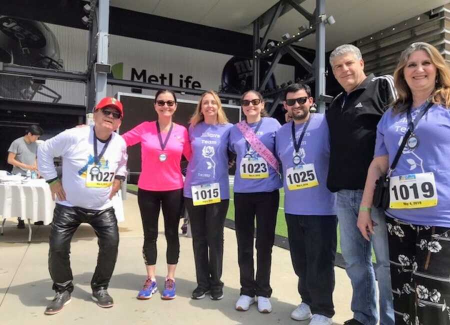 Woman in front of metlife building with others