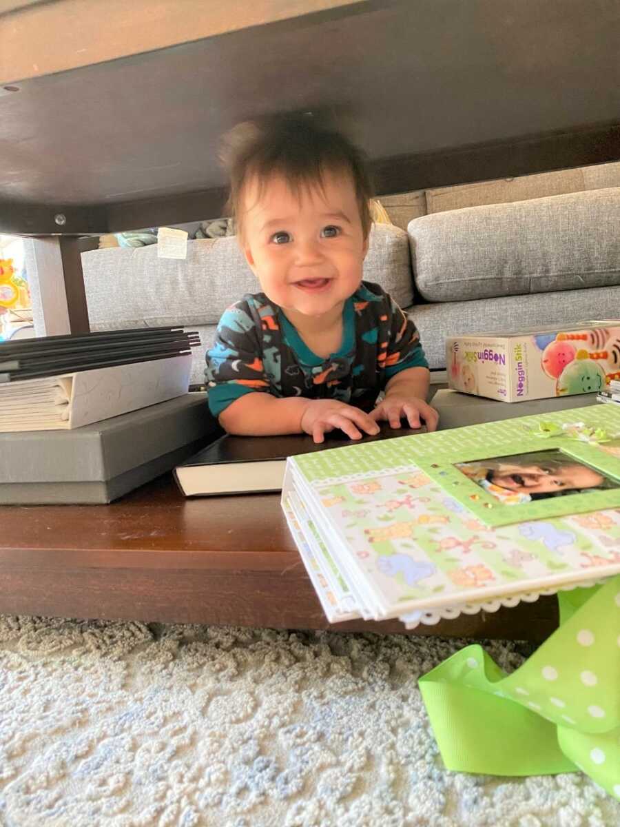 Sami slides through the coffee table, one of his favorites moves. 