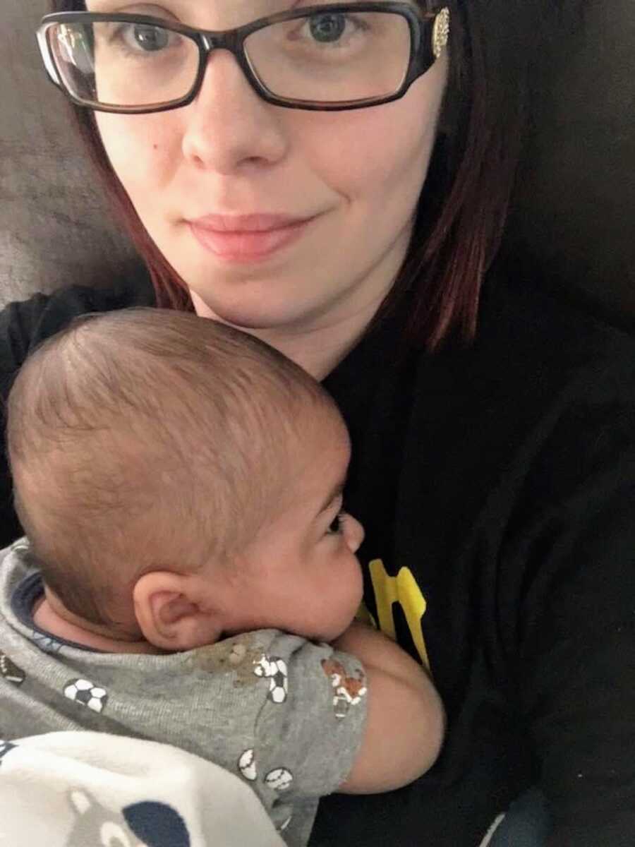 mom holding her baby boy 