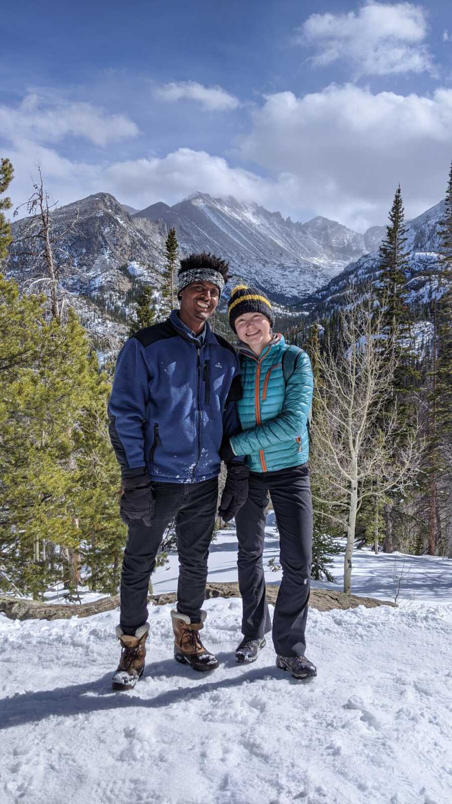 couple on a mountian hiking