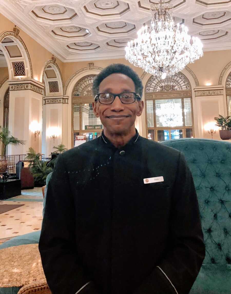 Portrait of a Bellhop at the lobby of the Omni Hotel