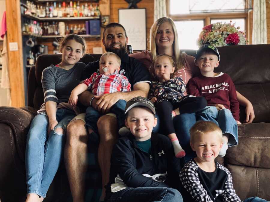 family of 8 sitting together