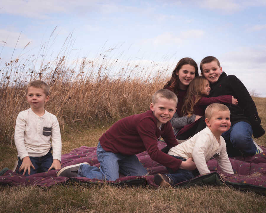 family portrait in a field