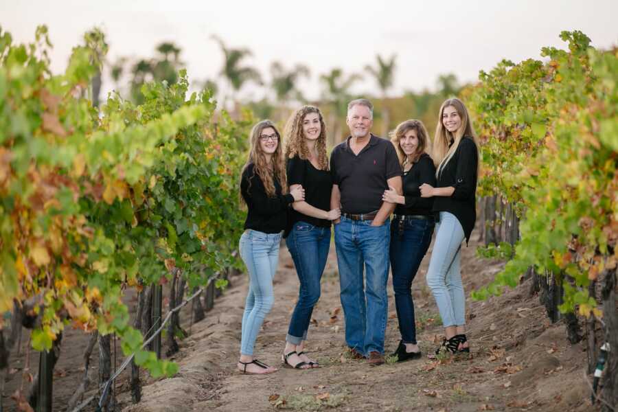 family photo in a vineyard