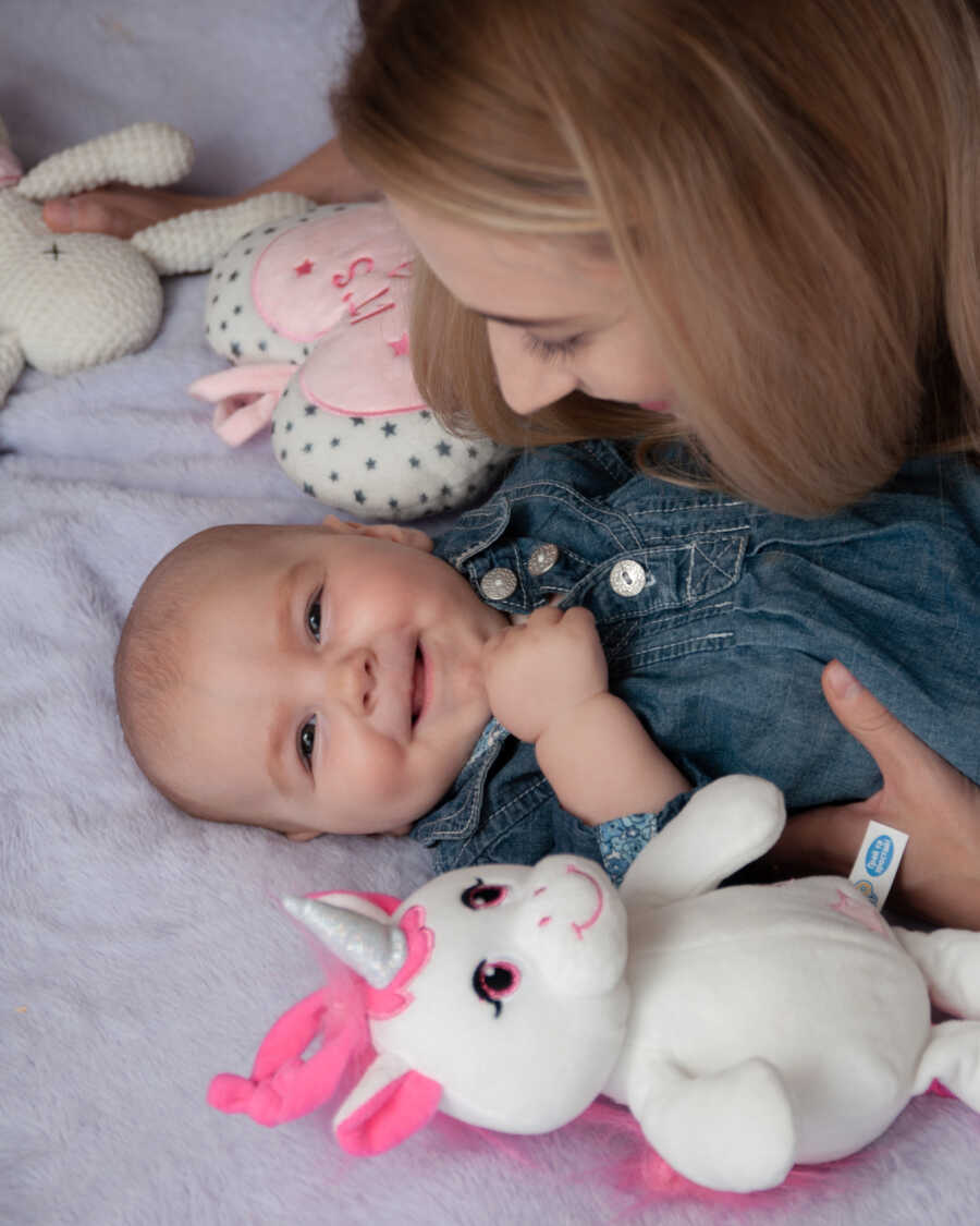 baby with SMA smiling and giggling