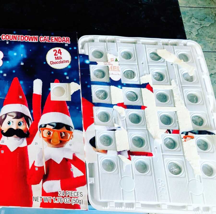 Empty milk chocolate Advent Calendar after toddler ate them all in one sitting 