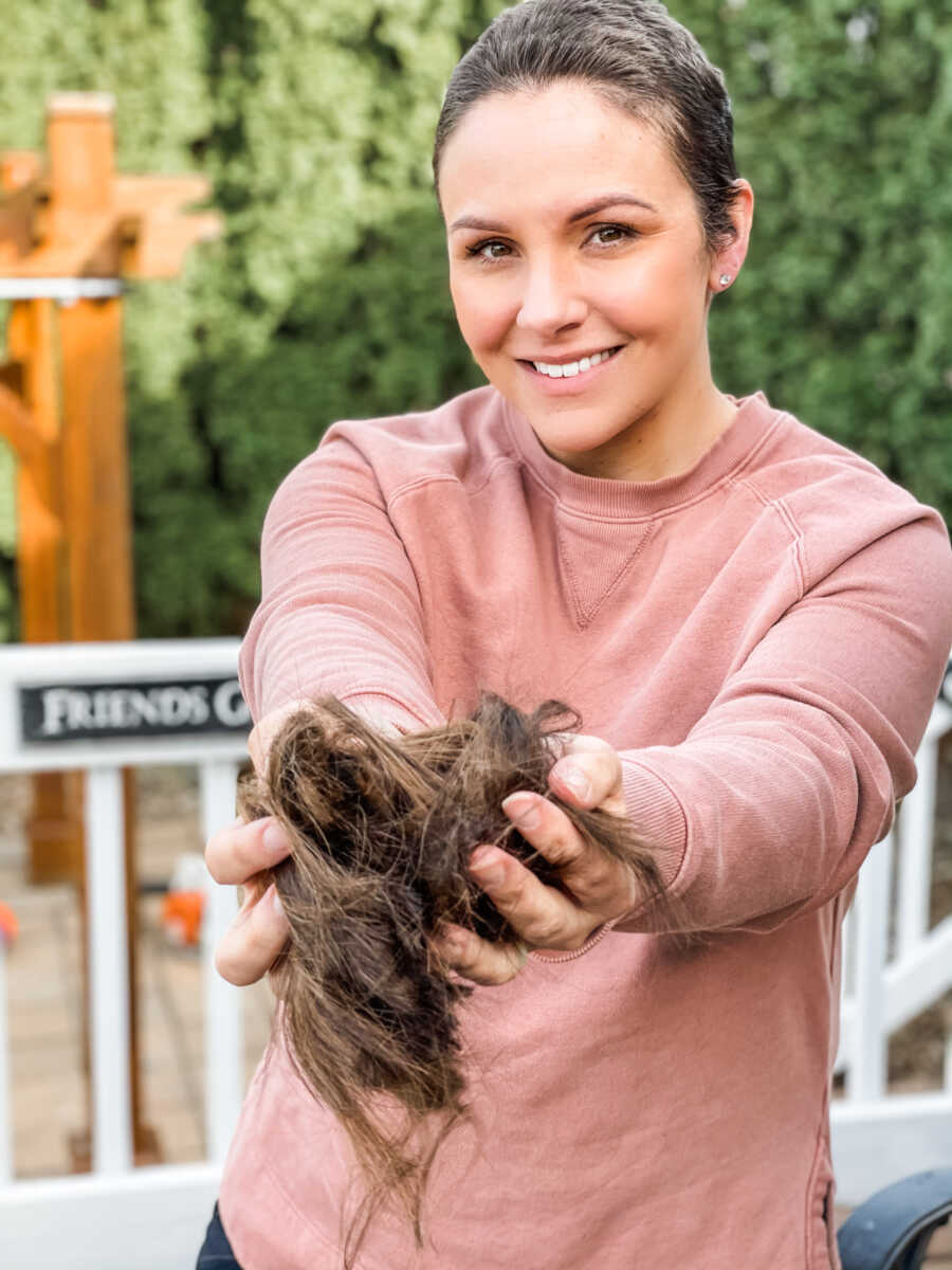 mom holding an animal