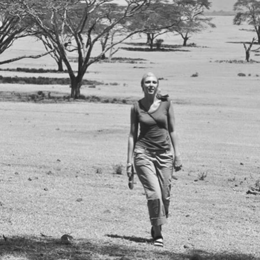 woman walking in the desert where she was held captive