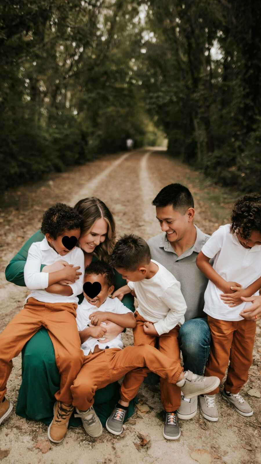 parents with their four kids including their foster kids