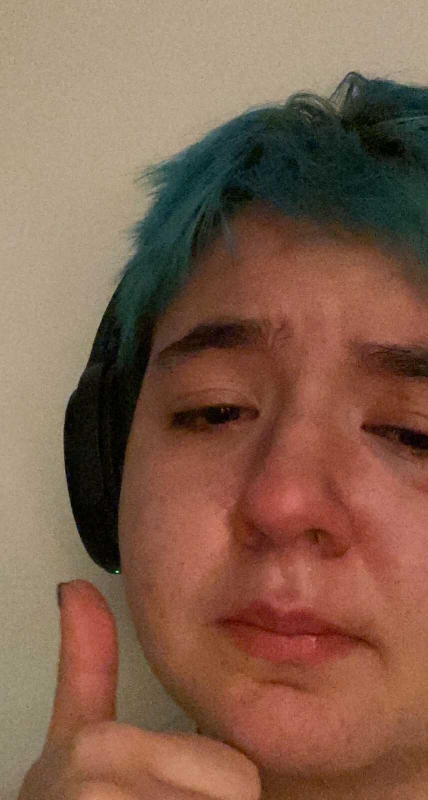 young teen crying