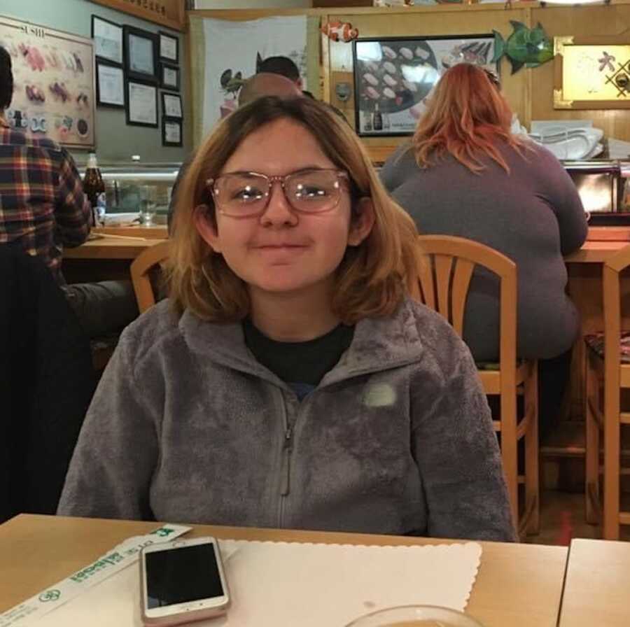 teen in a restaurant