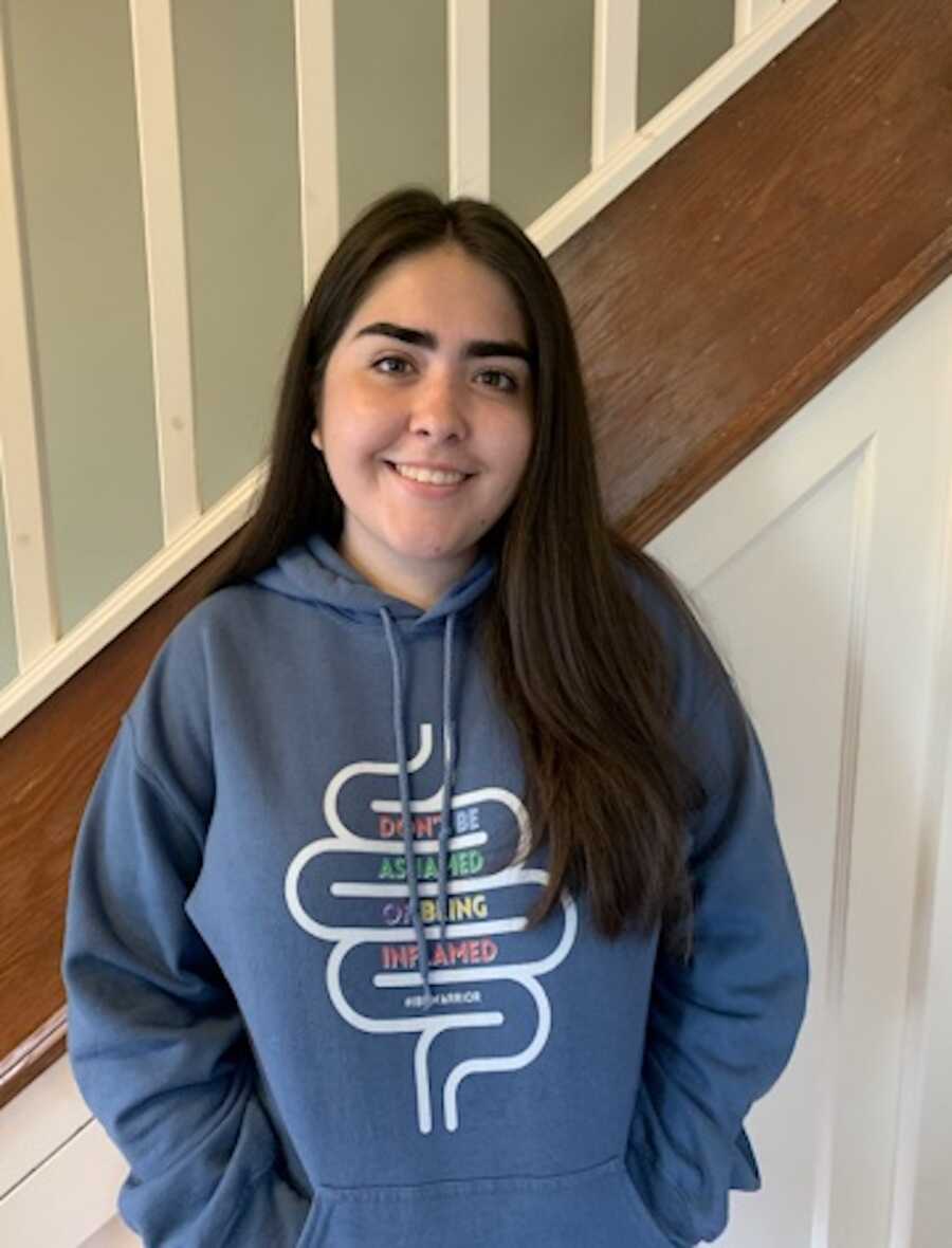 girl in a Crohn's sweatshirt