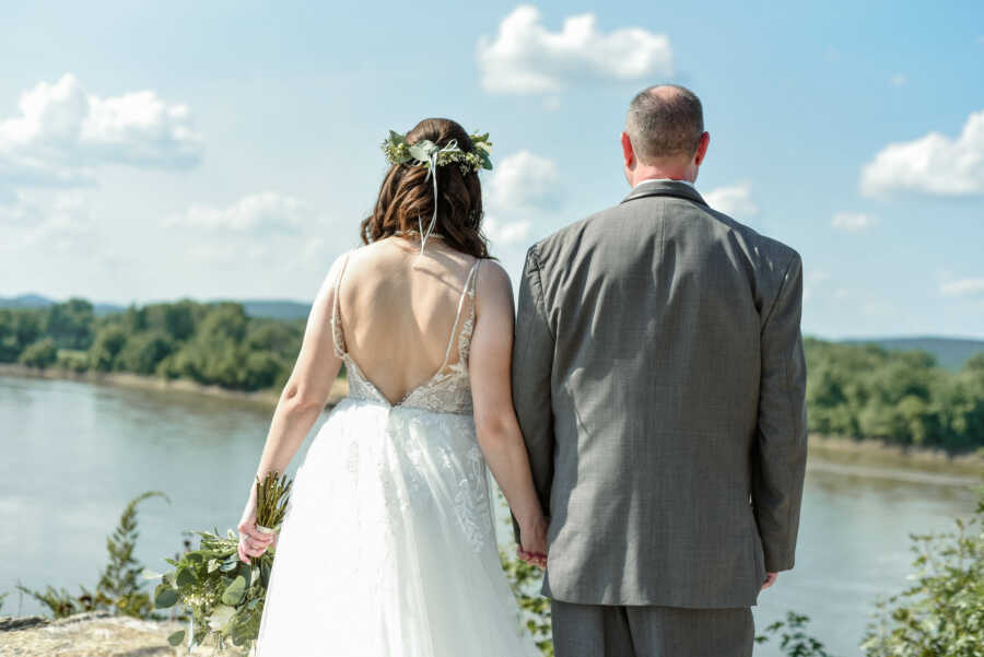 couple together on their wedding day