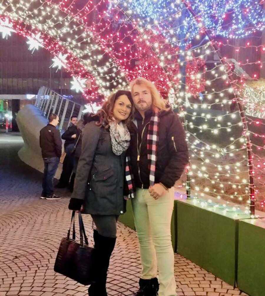 couple posing together on christmas