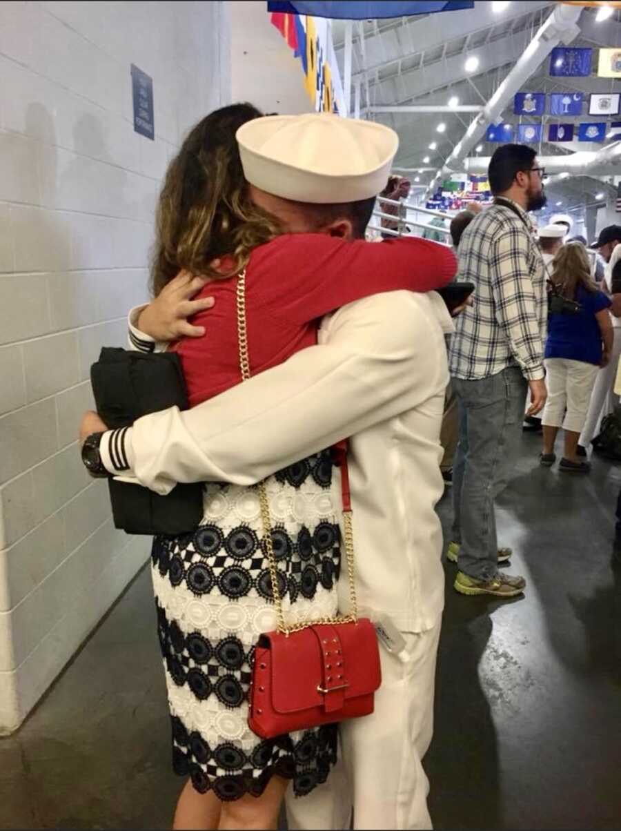 mom hugging her military son