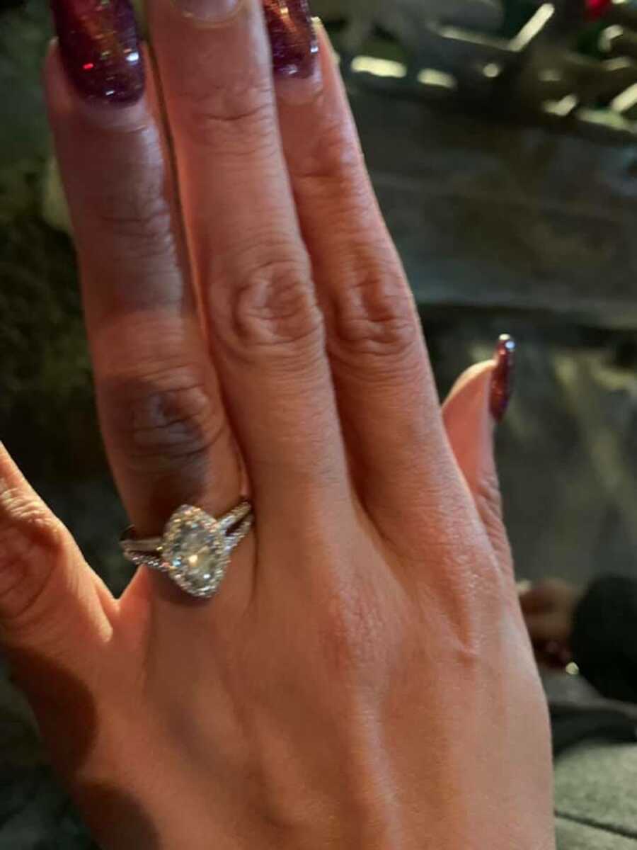engagement ring on a woman's finger