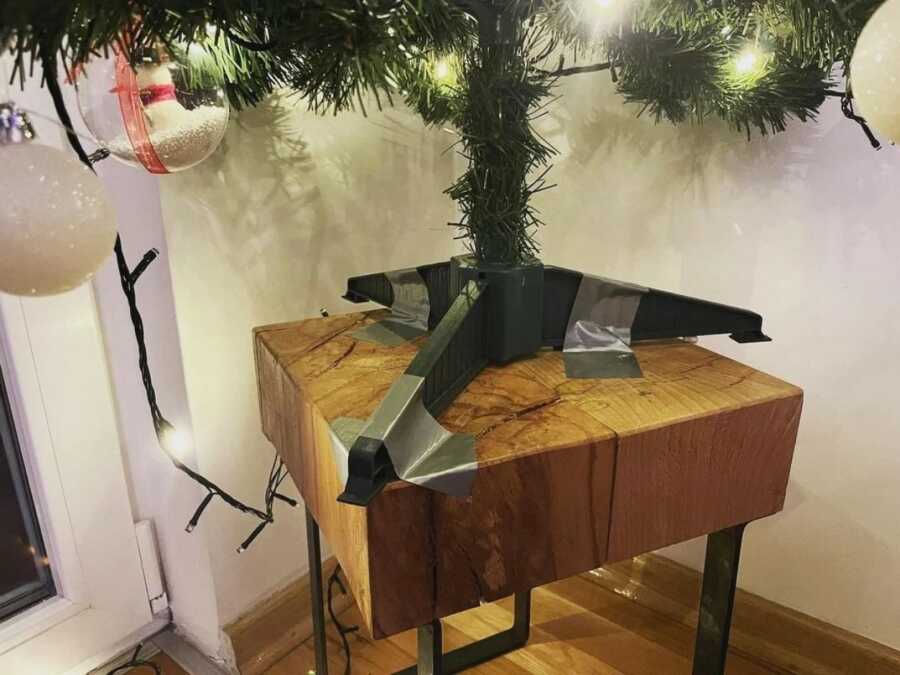 tree taped on a table to protect frompets