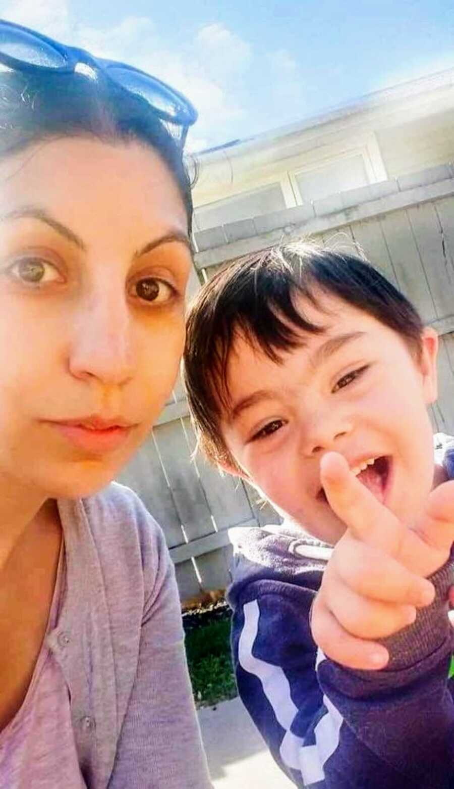 Mom takes a selfie with her son born with down syndrome