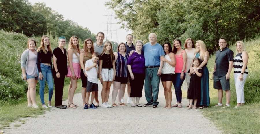 large family photo outside