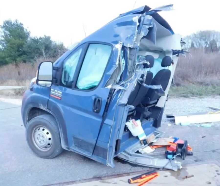 the amazon delivery truck after it was cut in half by a train