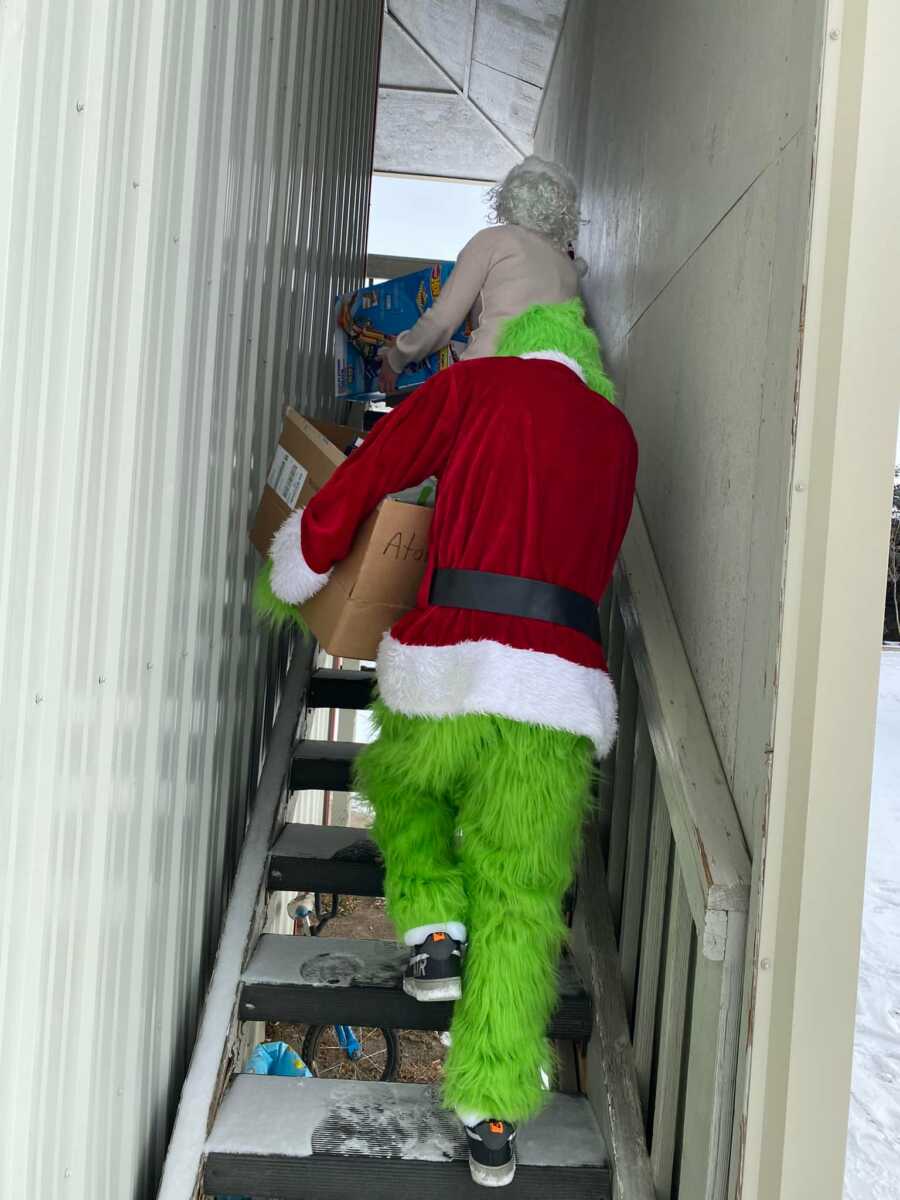 santa and grinch with gifts