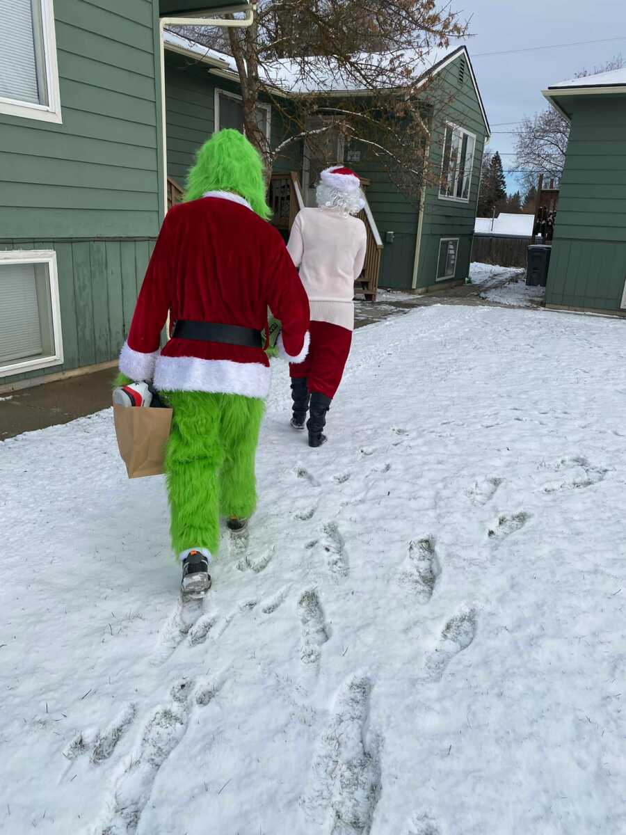 santa and grinch going to give gifts