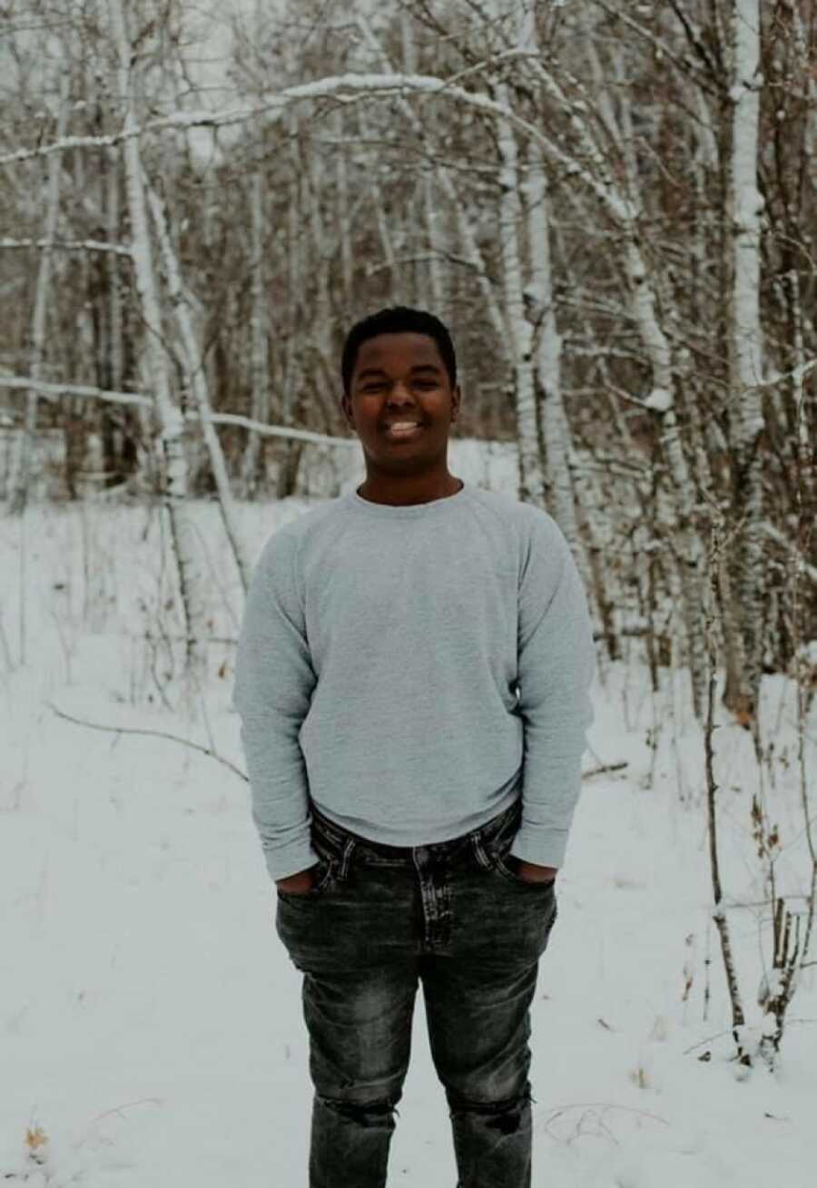 solo shot of son posing in the snow