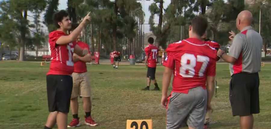 deaf football team practicing together