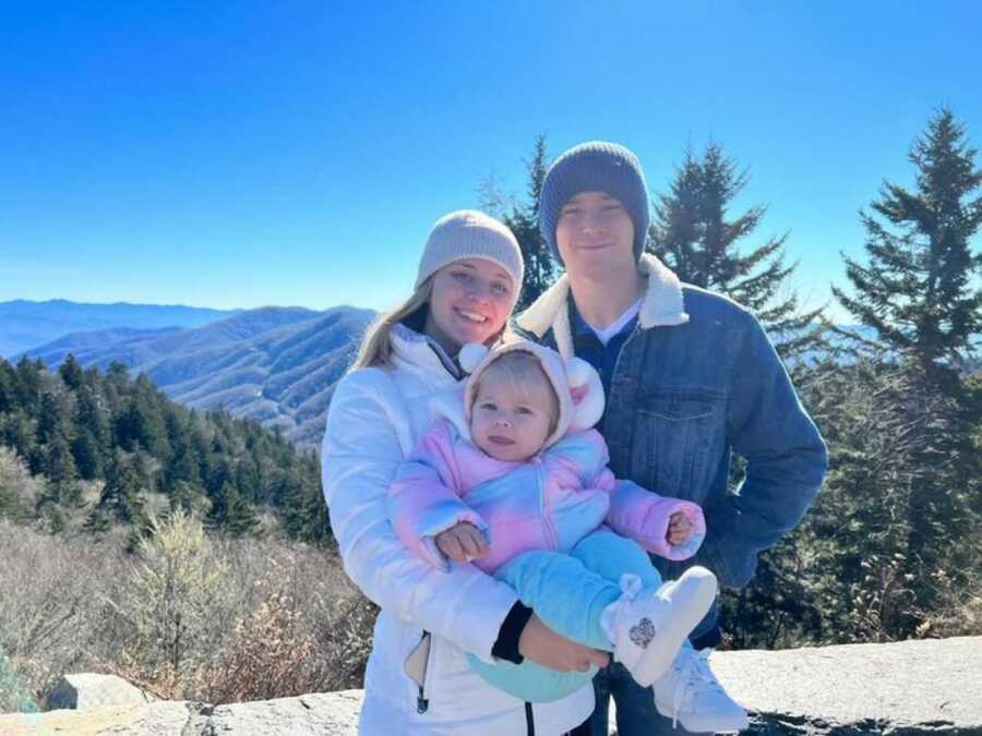 young family all together smiling and happy