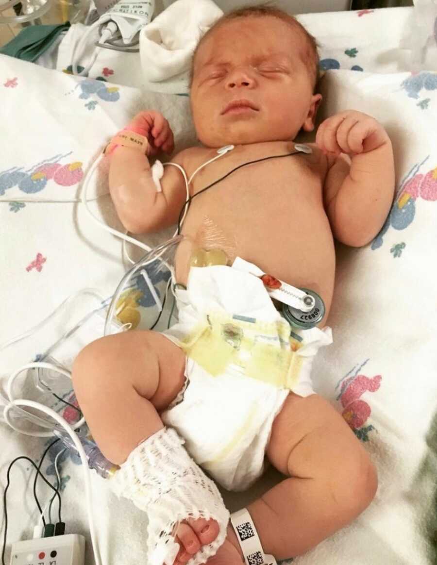 son hooked up to things in the hospital to make sure he is okay