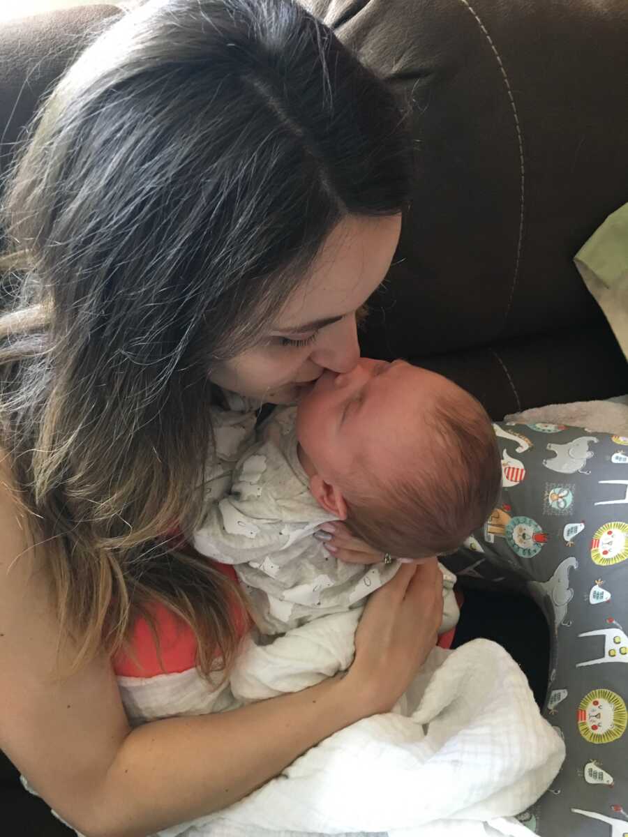 mom kissing her son 