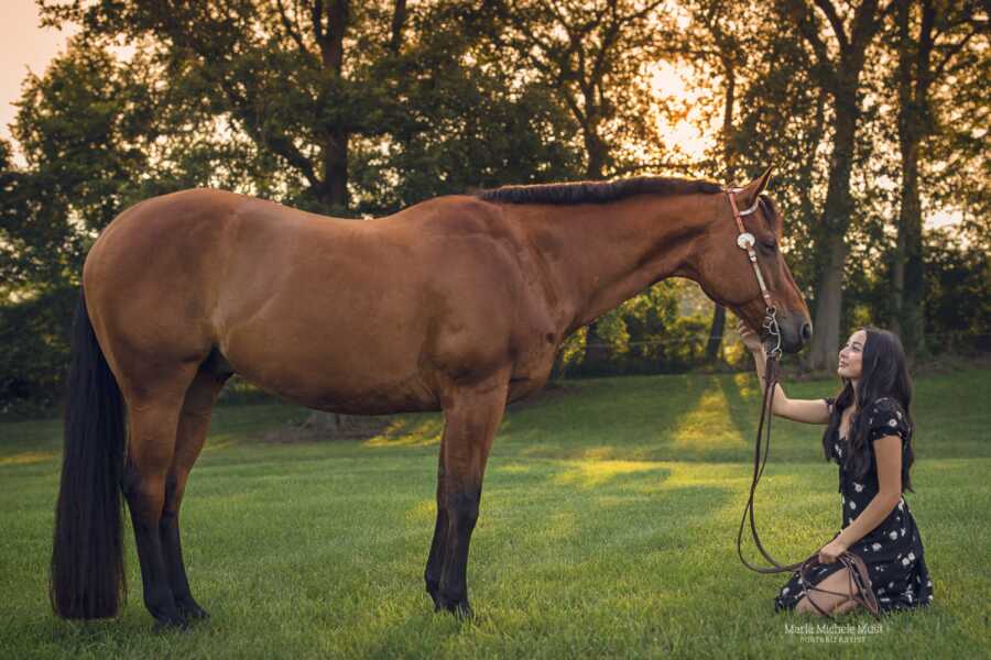 senior who was shot in oxford shooting petting her horse at golden hour