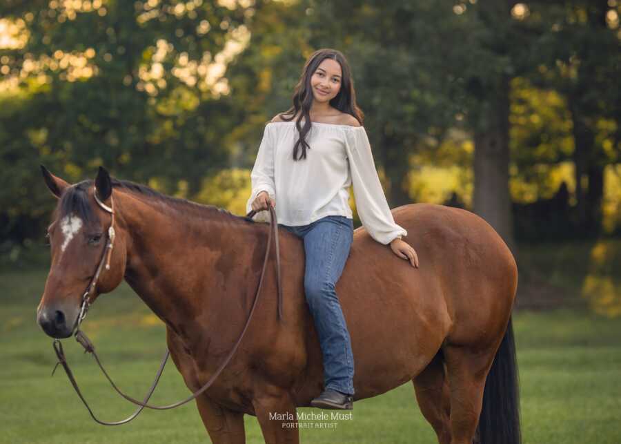 senior who was shot in oxford shooting on her horse smiling