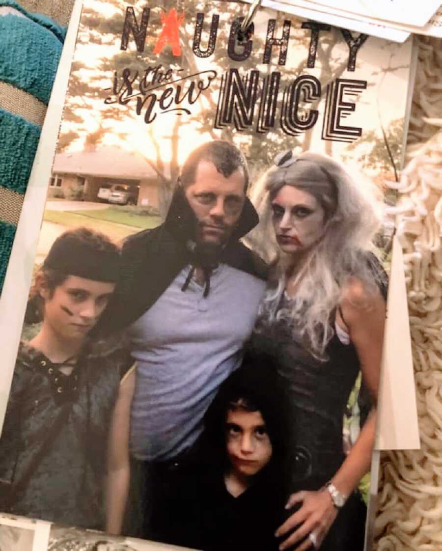 A Christmas card with family dressed as zombies