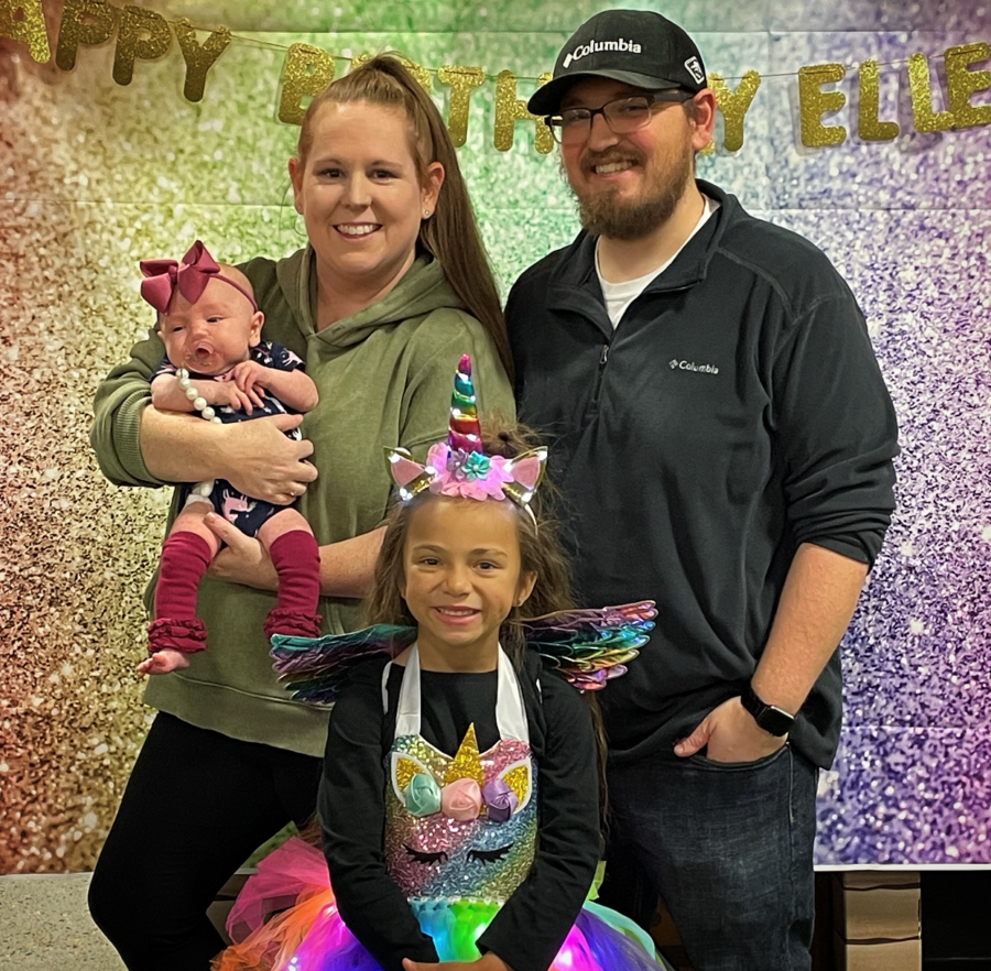 family photo in front of a bright background