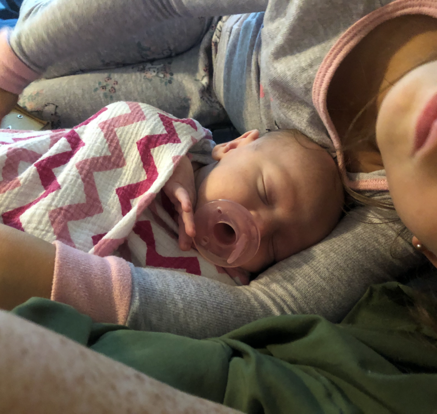 baby sleeping on mom's chest