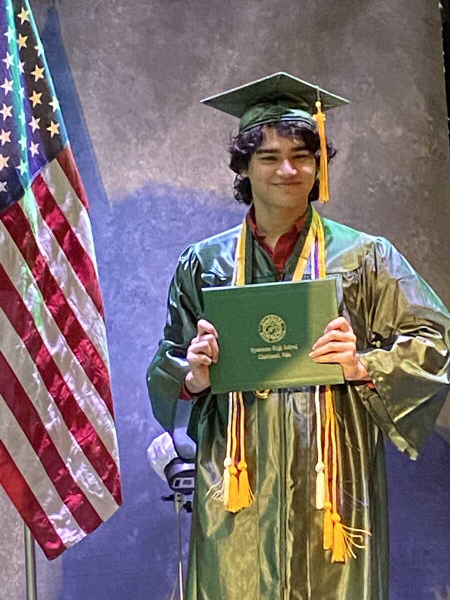 kid who graduated magna cum laude in high school after struggling